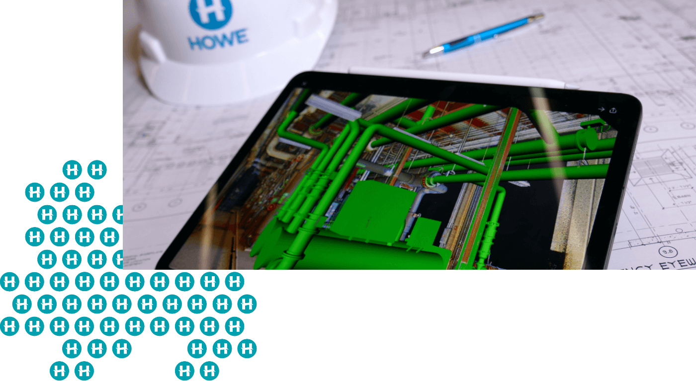 Design and Engineering VDC CAD design on tablet with hardhat in background